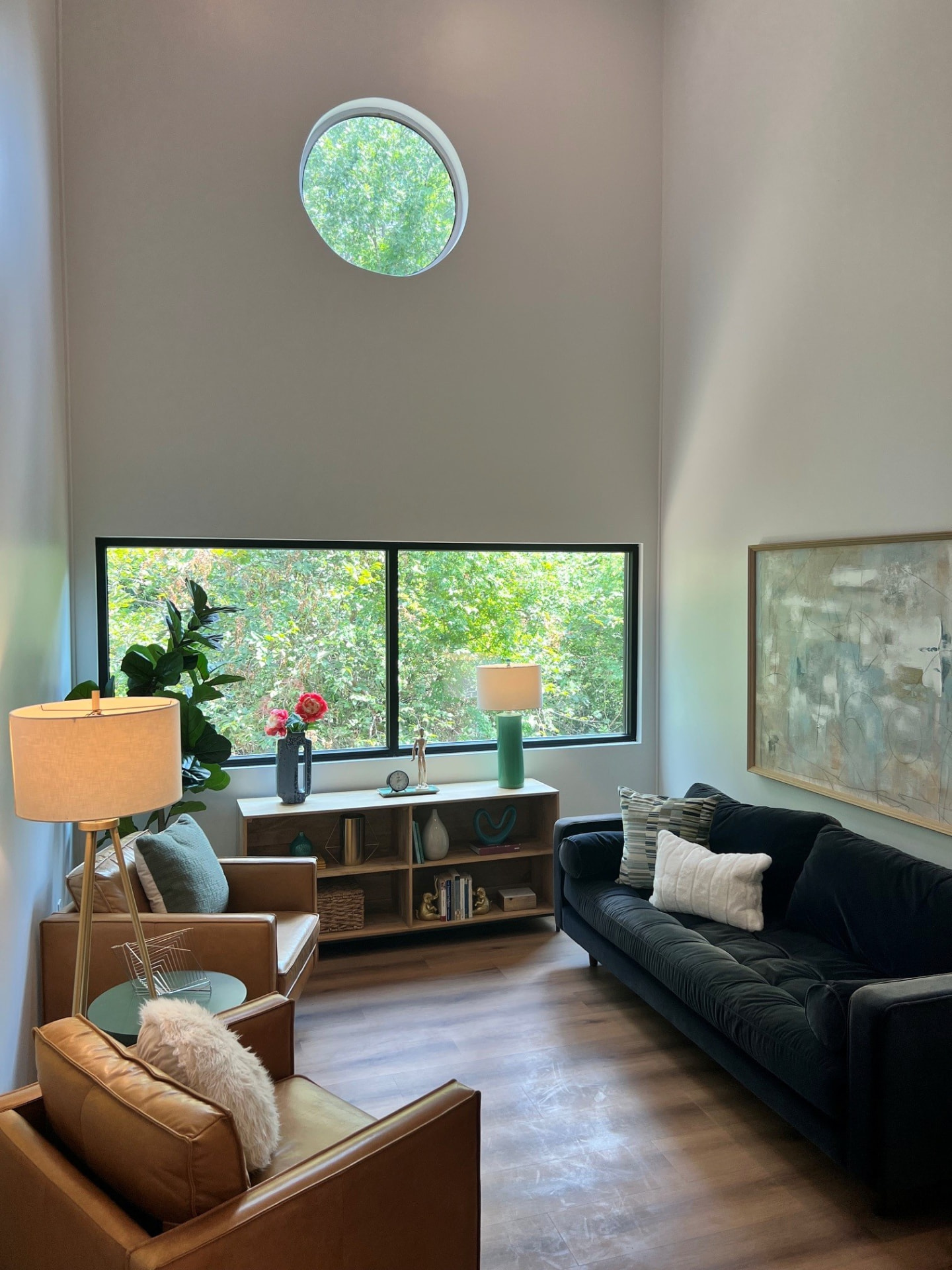 A double-height window filling a Dallas Therapy Associates office with natural light